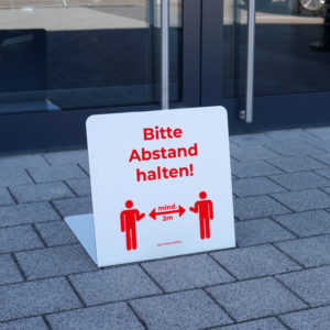 bitte Abstand halten Schild